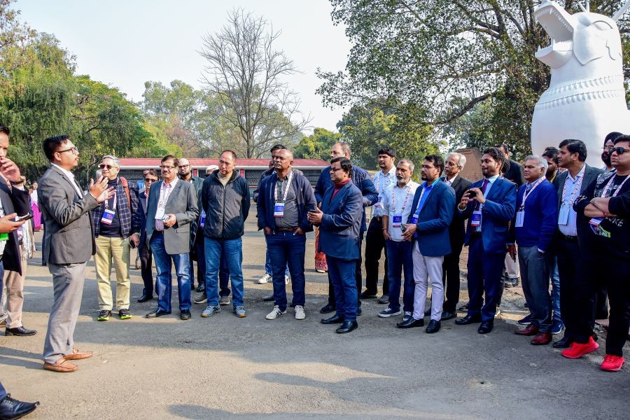 The G20/B20 delegates at Kangla, a historical fort in the heart of Imphal, on Sunday before leaving for New Delhi.